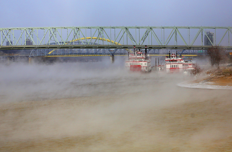 cold  January 6, 2014   Steam rises up along the Ohio River in Covington, Kentucky on Monday, January 6, 2014.  The Enquirer/Leigh Taylor