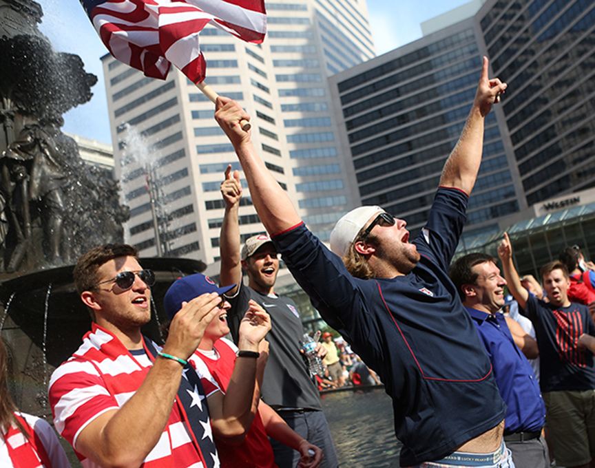 worldcup  June 16, 2014  Joe Moran (cq), from Loveland, shows his spirit for the United States during a World Cup viewing party on Fountain Square on Monday, June 16, 2014.  The United States soccer team is playing their first game tonight against Ghana.  The Enquirer/Leigh Taylor