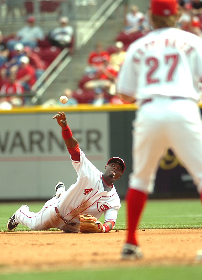 REDS  APRIL 7, 2008  Second-baseman Brandon Phillips throws the ball to first-baseman Jeff Keppinger for an out as the Reds take on the Philadelphia Phillies at the Great American Ball Park on Monday afternoon.  The Enquirer/Leigh Taylor