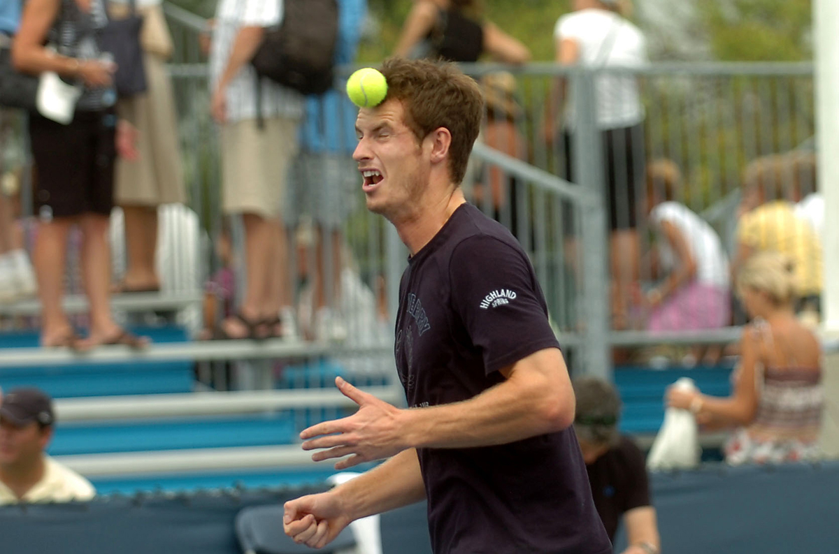 TENNISLT AUGUST 18, 2009  Andy Murray head-butts the tennis ball while playing a soccer-type game while practicing during the Western and Southern Financial Group Masters and Womens Open at the Lindner Family Tennis Center in Mason on Tuesday, August 18, 2009.  Murray and several people were playing a game in which they had to get the ball over the net using their heads and feet.  The Enquirer/Leigh Taylor