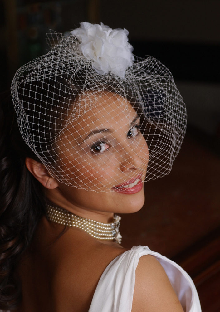 CINWEEKLY  JANUARY 19, 2005  Tina Glass models a wedding dress from Bridal and Formal.  (Photo by Leigh Patton/Cin Weekly)